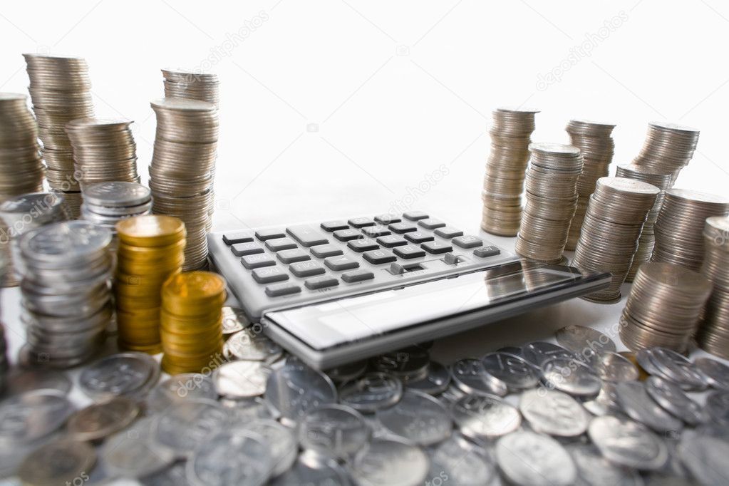 depositphotos_11069546-stock-photo-calculator-between-pile-of-coins.jpg